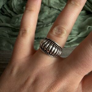 Two tone fluted dome ring in sterling silver and 18k yellow gold.